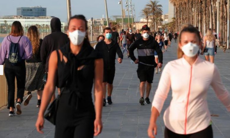 Masca devine obligatorie în Spania până când virusul va dispărea